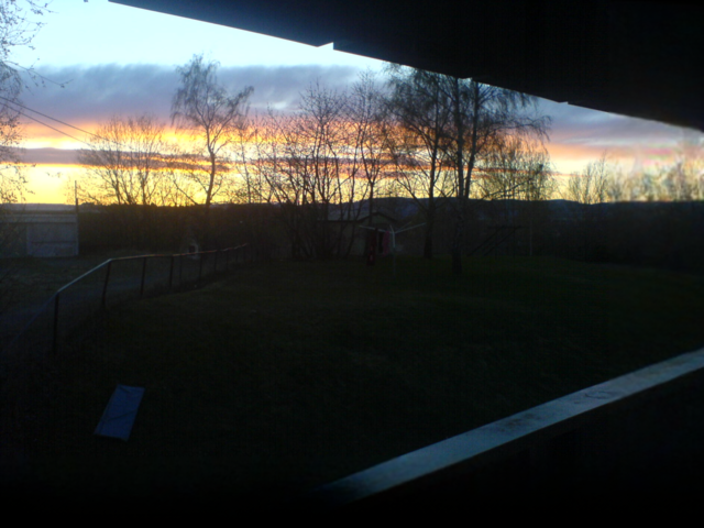 The same landscape photograph with a locally generated right and bottom border
